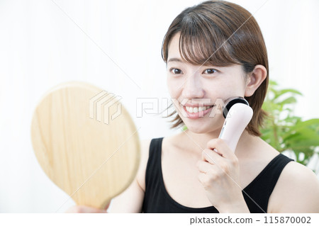 Beauty Woman using facial beauty device Beauty Woman using facial beauty device 115870002