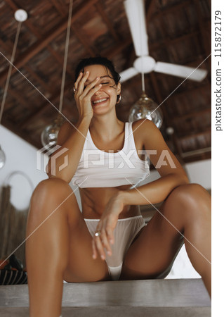 Sexy Asian Model Playfully Laughing in a Bali Villa 115872179