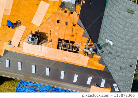 Replacement of old asphalt bitumen shingles on roof of residence Replacement of old asphalt bitumen shingles on roof of residence 115872306