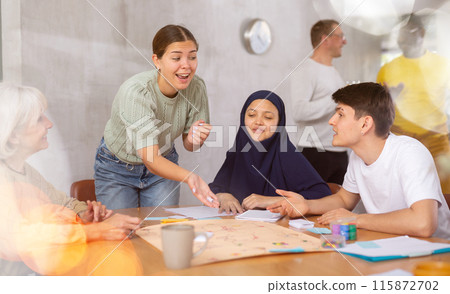 Group of of different years people playing tabletop game Group of of different years people playing tabletop game 115872702