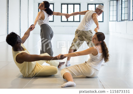 Group of artists demonstrating art performance 115873331