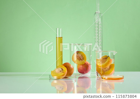 A group of experiment tools placed on the right side of white table top in lab, against the green background. Blank right space for product presentation, front view photo 115873804