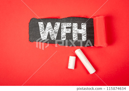 WFH work from home. Text under torn red paper on a blackboard WFH work from home. Text under torn red paper on a blackboard 115874634