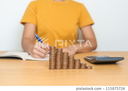 Money Saving for Future Plan, Retirement fund, Pension, Investment, Wealth Business and Financial concepts. Woman calculate and counting money coins on table Money Saving for Future Plan, Retirement fund, Pension, Investment, Wealth Business and Financial concepts. Woman calculate and counting money coins on table 115875726