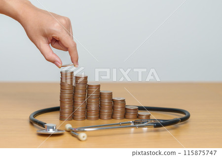 Money Saving, Health Insurance, Medical, Donation and Financial concepts. coins stack with stethoscope, Money stack Counting arrangement for deposit and Healthcare cost 115875747