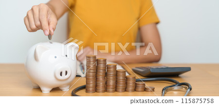 Money Saving, Health Insurance, Medical, Donation and Financial concepts. woman with coins stack and piggy bank and stethoscope, Money stack Counting arrangement for deposit and Healthcare cost Money Saving, Health Insurance, Medical, Donation and Financial concepts. woman with coins stack and piggy bank and stethoscope, Money stack Counting arrangement for deposit and Healthcare cost 115875758