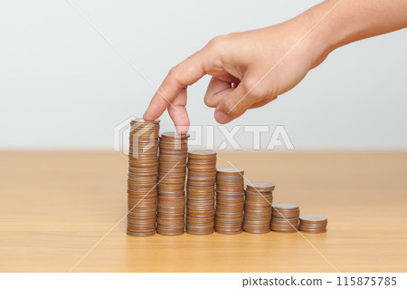 Money Saving for Future Plan, Retirement fund, Pension, Investment, Wealth, Salary and Financial concepts. hand step up coin on table, Money Counting and stack arrangement for Growth Money Saving for Future Plan, Retirement fund, Pension, Investment, Wealth, Salary and Financial concepts. hand step up coin on table, Money Counting and stack arrangement for Growth 115875785