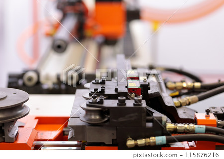 automatic industrial pipe bending machine close up 115876216