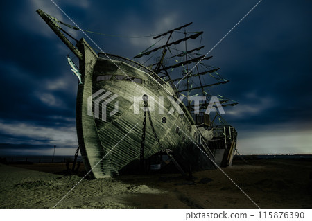 Shipwreck play equipment installed in a seaside park 115876390