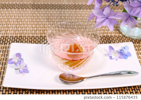 Cool plum jelly made in a glass container 115876435