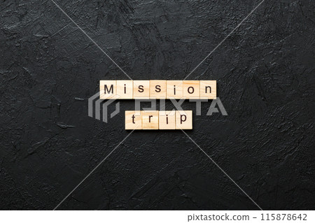 Mission Trip word written on wood block. Mission Trip text on table, concept Mission Trip word written on wood block. Mission Trip text on table, concept 115878642
