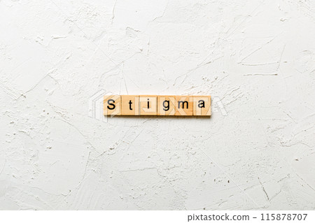 stigma word written on wood block. stigma text on table, concept 115878707