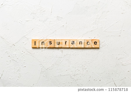 insurance word written on wood block. insurance text on table, concept insurance word written on wood block. insurance text on table, concept 115878718
