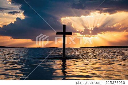 Jesus Christ cross, Christian cross on a background of dramatic sky 115878930