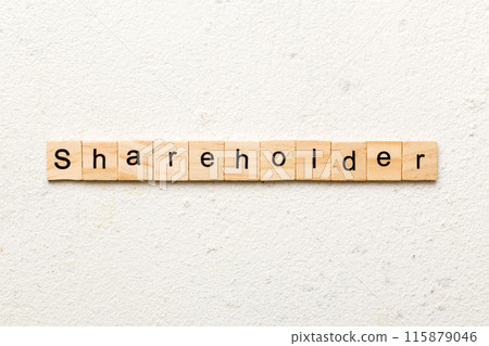 shareholder word written on wood block. shareholder text on table, concept shareholder word written on wood block. shareholder text on table, concept 115879046
