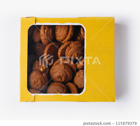 Box of homemade cookies isolated on white background Box of homemade cookies isolated on white background 115879379