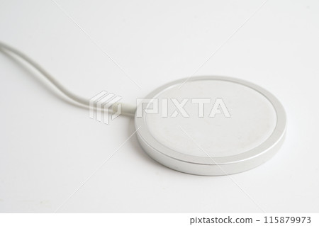 Wireless magnetic charger, modern equipment for mobile phone on white background. Wireless magnetic charger, modern equipment for mobile phone on white background. 115879973