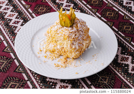 Traditional middle eastern dessert on ornate tablecloth Traditional middle eastern dessert on ornate tablecloth 115880024
