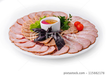 Sliced roast pork platter with mustard sauce 115882178
