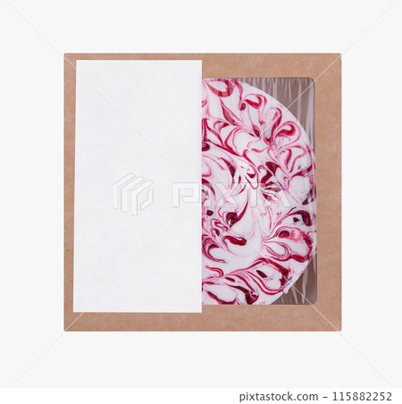 Pre-packaged cheesecake with cherry swirl design in a cardboard box, ready for sale Pre-packaged cheesecake with cherry swirl design in a cardboard box, ready for sale 115882252