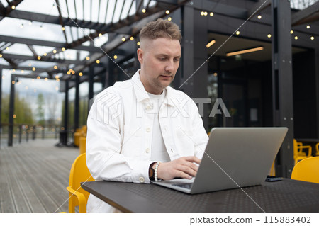 Homemade sourdough bread. Woman hands cuts the bread on cutting board. Handcrafted. Wooden cutting board.  115883402