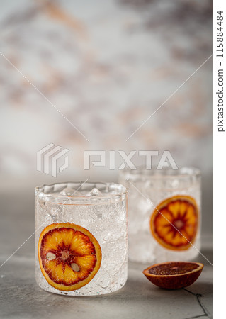 Cold water with red orange Cold water with red orange 115884484