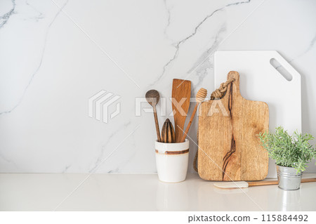 Kitchen utensils background 115884492