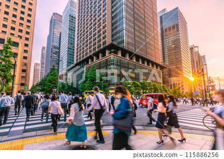 Tokyo cityscape in Japan. View of the intersection in front of Otemachi Station, people returning home, etc. On the left is Marunouchi, heading towards Tokyo Station = June 14th 115886256