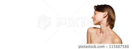 Banner. Woman with short brown hair tilts her head back against white studio background with negative space to insert your text. Banner. Woman with short brown hair tilts her head back against white studio background with negative space to insert your text. 115887580