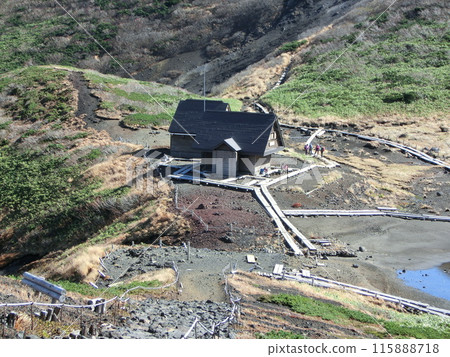 View of a large mountain hut View of a large mountain hut 115888718