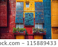 Colorful building facade with solar panels, modern and eco-friendly urban design. 115889433