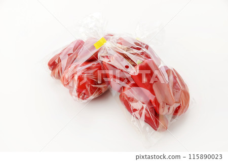 Red peppers in a transparent bag Red peppers in a transparent bag 115890023