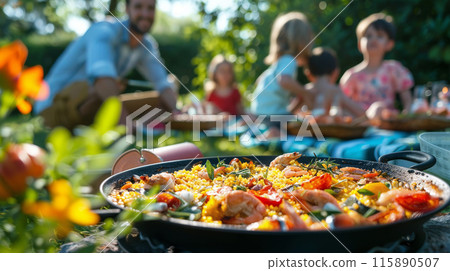 Family Enjoying Homemade Paella Outdoors 115890507