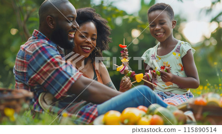 friends and family eating and cooking at a garden 115890514