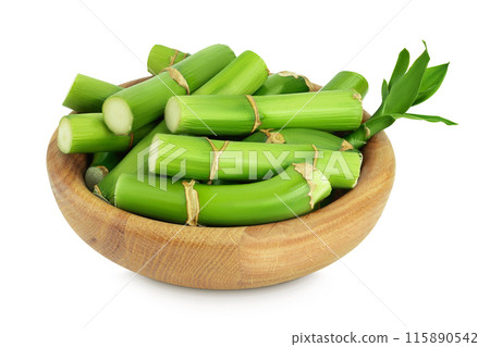 Green bamboo with leaves in wooden bowl isolated on white background with full depth of field 115890542