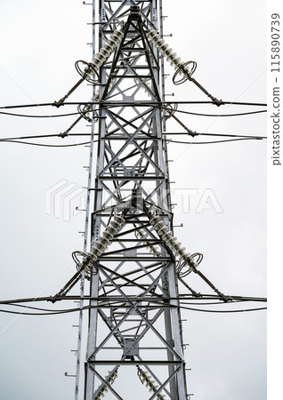 Dilbeek, Flanders, Belgium - High tension energy cable and pole Dilbeek, Flanders, Belgium - High tension energy cable and pole 115890739