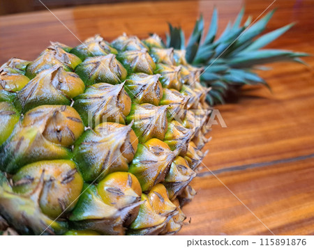 Close-up of a fresh pineapple Close-up of a fresh pineapple 115891876