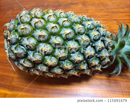 Close-up of a fresh pineapple Close-up of a fresh pineapple 115891879