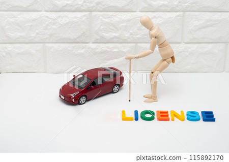 Image of a passenger car, elderly driver and driver's license Image of a passenger car, elderly driver and driver's license 115892170