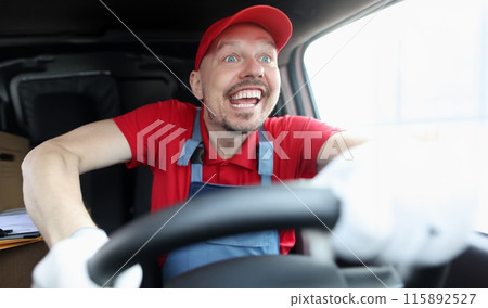 Happy young male courier driving fast car Happy young male courier driving fast car 115892527
