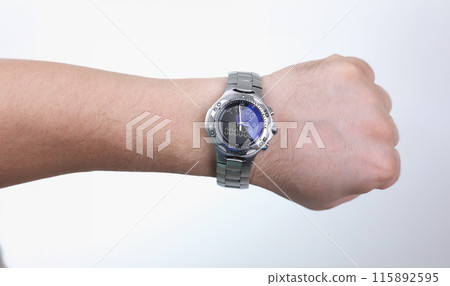 Man hand with silver wrist watch closeup Man hand with silver wrist watch closeup 115892595