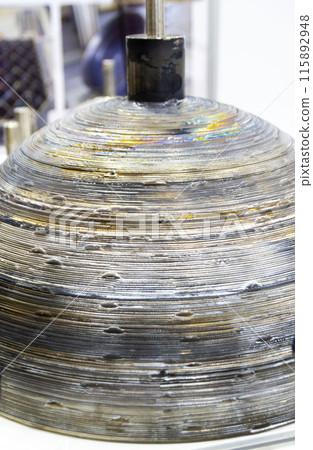 Object printed by 3D printer from metal. Additive manufacturing solution. Object created on 3Dprinter from melting metal thread. 3D Metal Printing. Metal additive manufacturing Object printed by 3D printer from metal. Additive manufacturing solution. Object created on 3Dprinter from melting metal thread. 3D Metal Printing. Metal additive manufacturing 115892948
