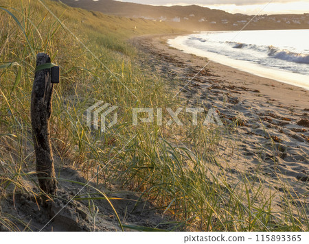 Beautiful sunset at Portnoo Narin beach in County Donegal - Ireland Beautiful sunset at Portnoo Narin beach in County Donegal - Ireland 115893365