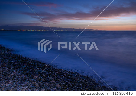 the blue hour over the sunset in the meditereanen sea 1 115893419