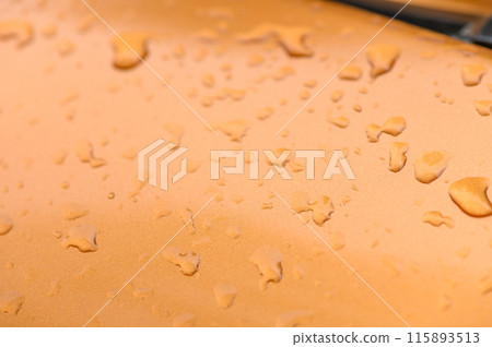 Background - raindrops on the metal surface of a modern car 3 Background - raindrops on the metal surface of a modern car 3 115893513