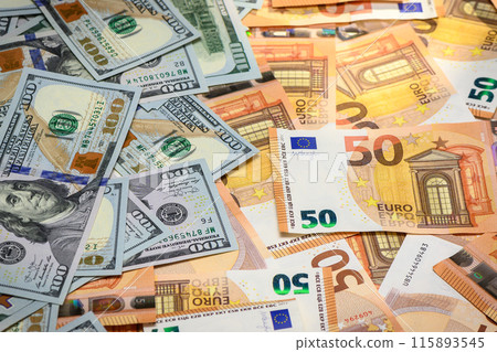 Money, Dollar and Euro. One hundred US dollar banknote over Euro banknotes. Foreign exchange market concept.2 115893545