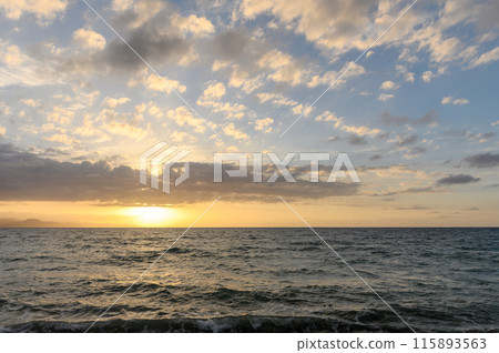 sunset over the Mediterranean sea in spring, clouds and sea 115893563