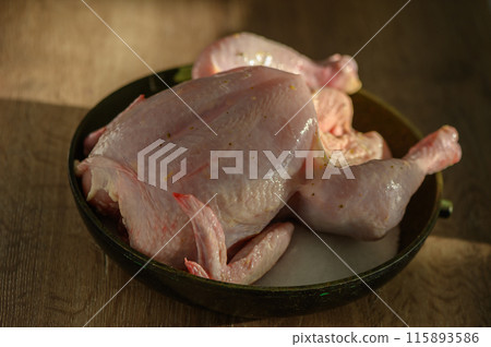 Chicken baked on salt. Selective focus, close-up. Chicken baked on salt. Selective focus, close-up. 115893586