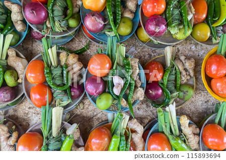 Fresh vegetables at the farmers market, tomatoes, onions, pepper, ginger 115893694