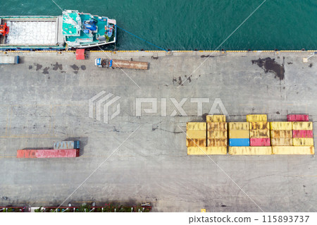 Loading a ship with containers at the port. Sea cargo transportation. Cargo Loading a ship with containers at the port. Sea cargo transportation. Cargo 115893737